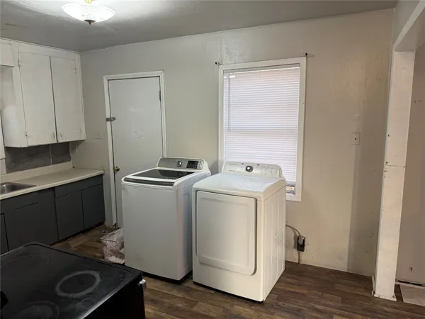 a utility room with dryer and washer