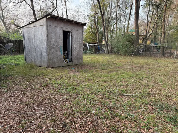 a backyard of a house with seating space