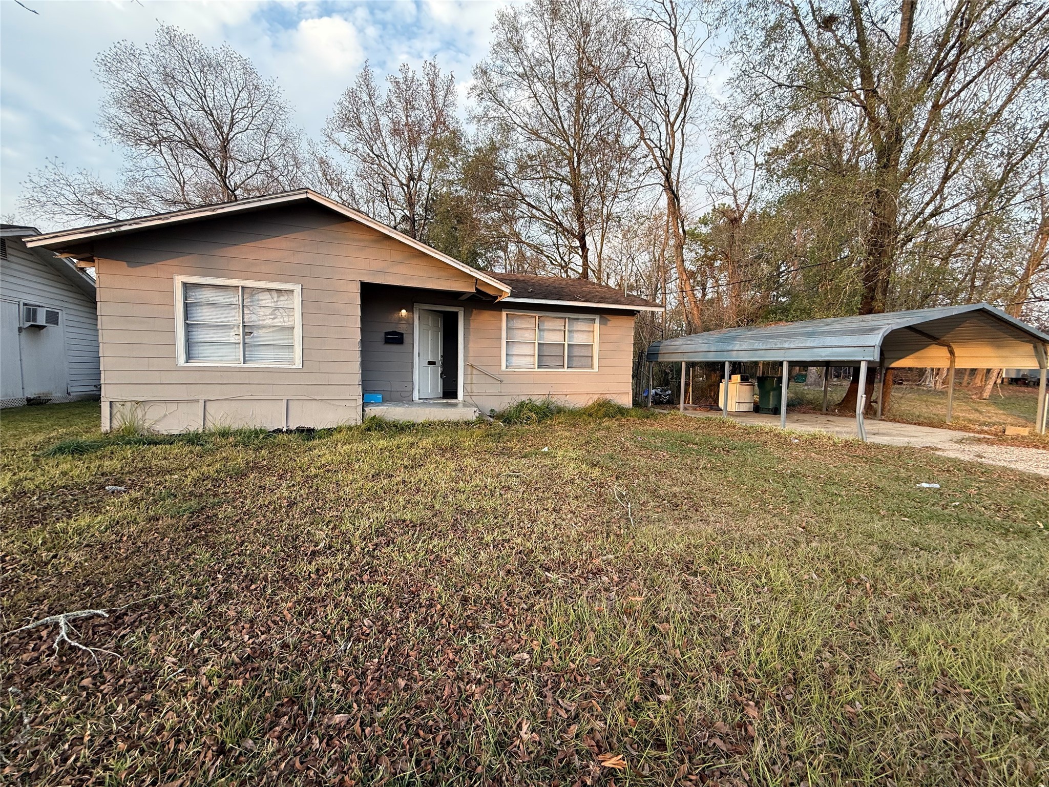 2210 Utica Street Beaumont, TX 77703 - Photo 17 of 17 a house with trees in the background
