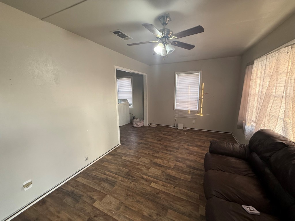 2210 Utica Street Beaumont, TX 77703 - Photo 3 of 17 a living room with furniture and a window