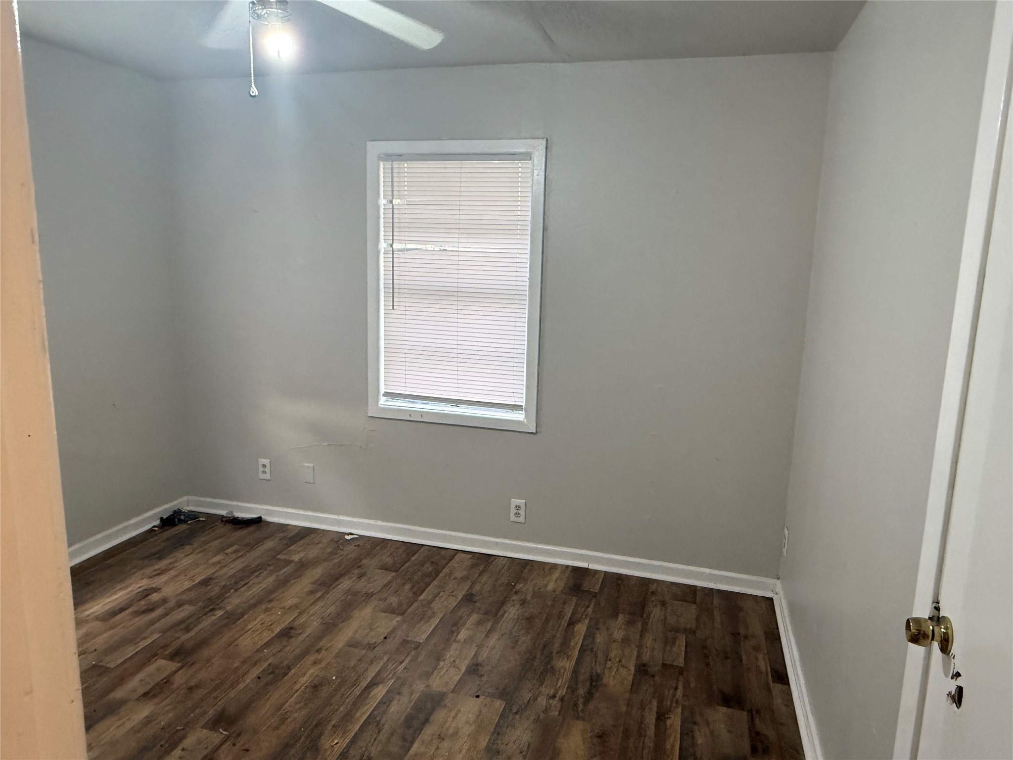 2210 Utica Street Beaumont, TX 77703 - Photo 5 of 17 an empty room with a window