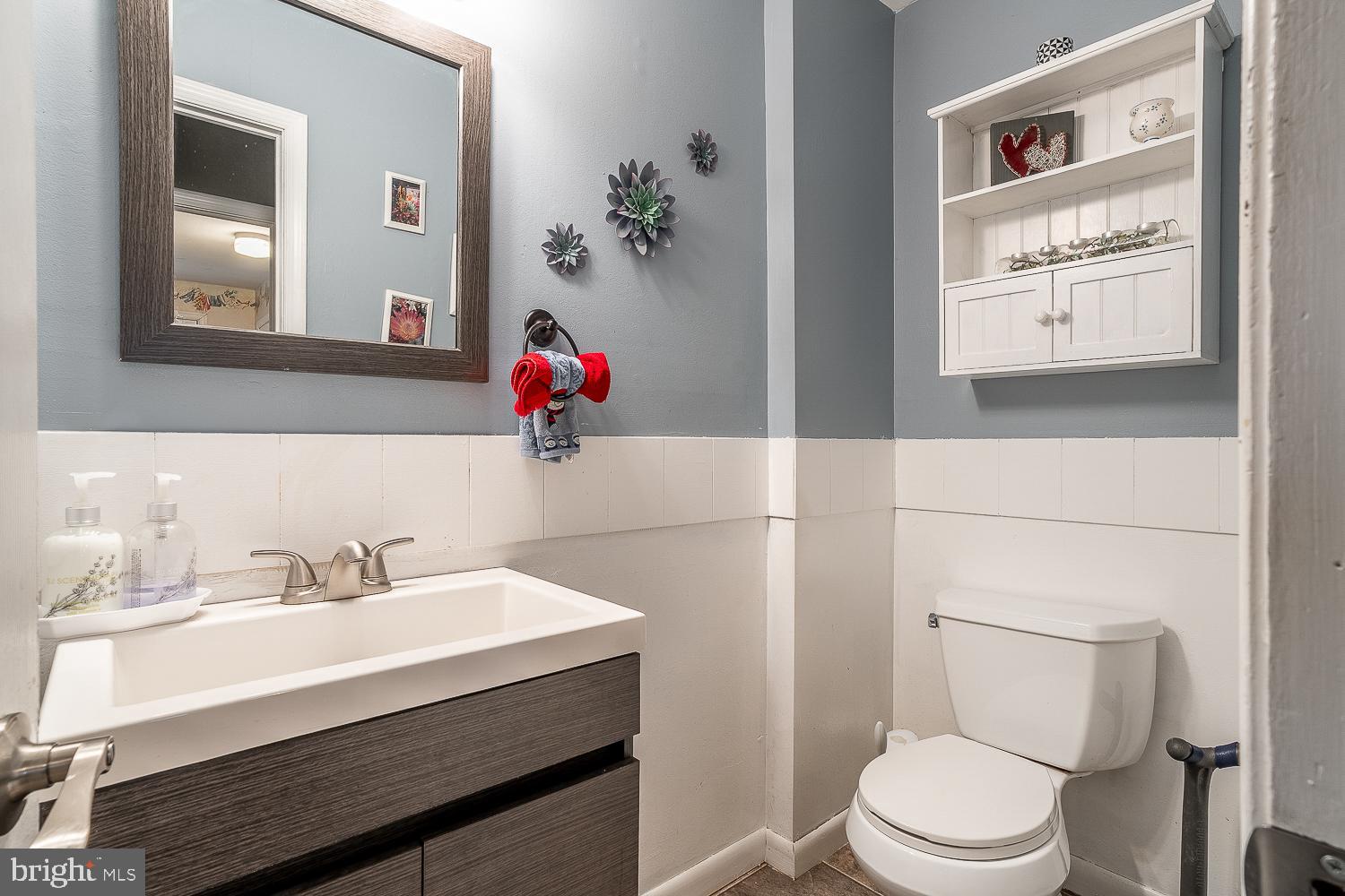 421 Hampton Lane Somerdale, NJ 08083 - Photo 15 of 35 a bathroom with a sink mirror and toilet