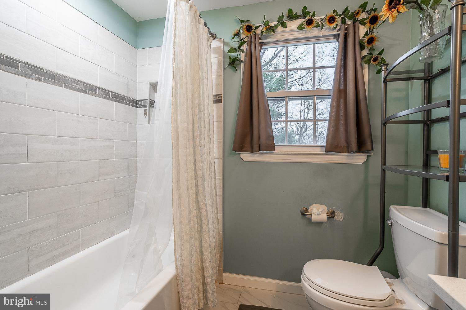 421 Hampton Lane Somerdale, NJ 08083 - Photo 21 of 35 a white toilet sitting next to a bath tub