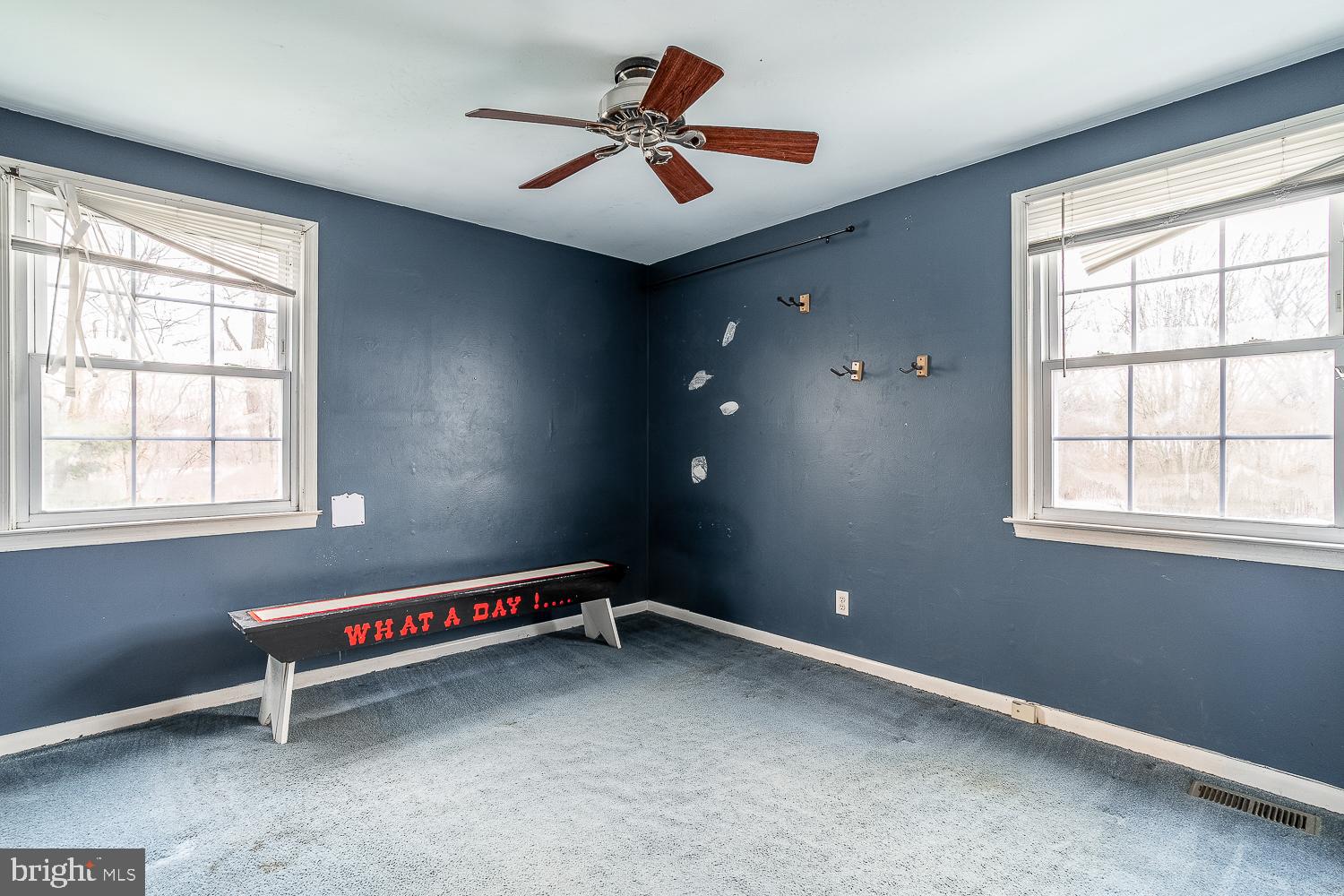 421 Hampton Lane Somerdale, NJ 08083 - Photo 22 of 35 an empty room with windows and ceiling fan