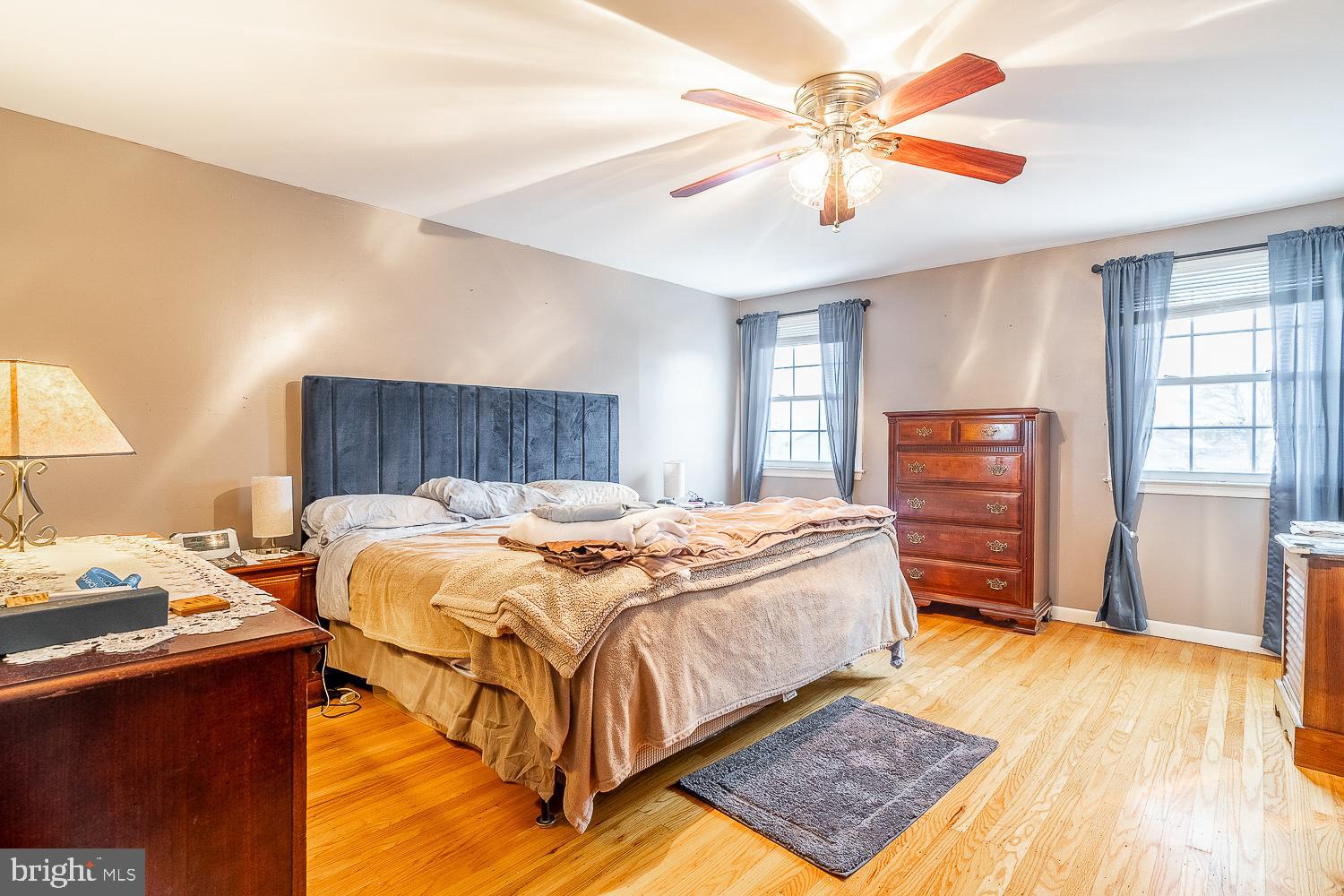 421 Hampton Lane Somerdale, NJ 08083 - Photo 24 of 35 a bedroom with a bed and a dresser