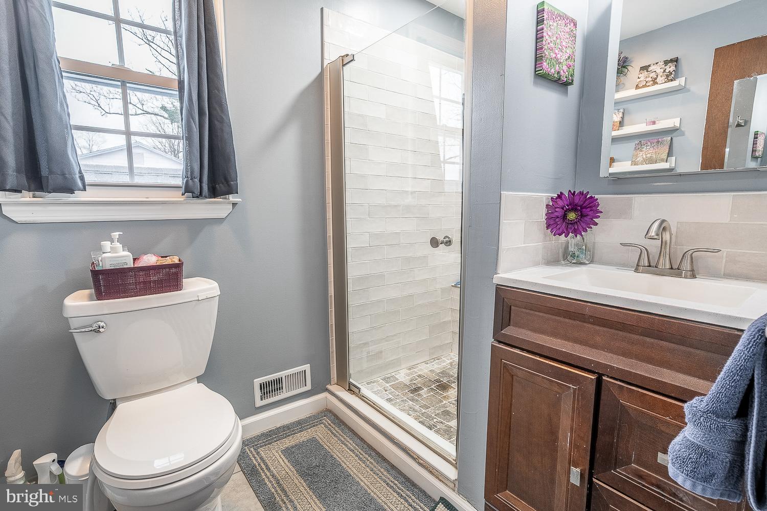 421 Hampton Lane Somerdale, NJ 08083 - Photo 27 of 35 a bathroom with a toilet sink and mirror
