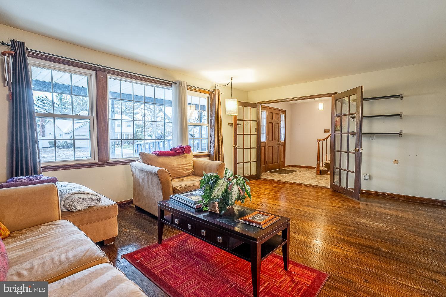 421 Hampton Lane Somerdale, NJ 08083 - Photo 4 of 35 a living room with furniture and a window