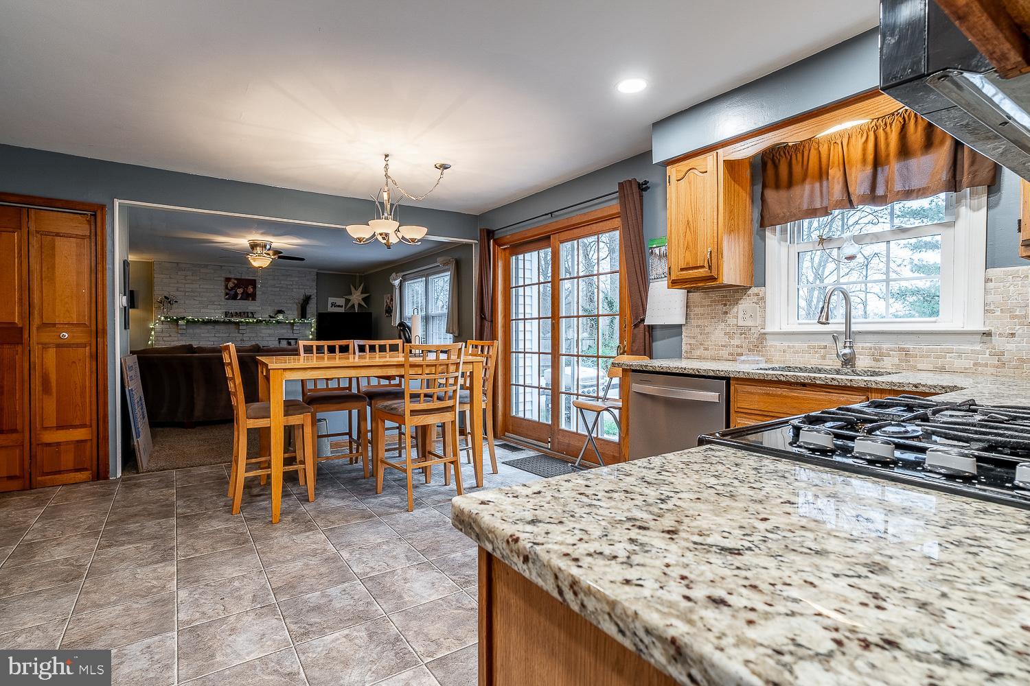 421 Hampton Lane Somerdale, NJ 08083 - Photo 8 of 35 a kitchen with a table and chairs in it