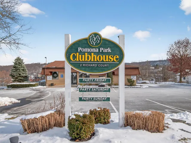 a sign on the side of a street