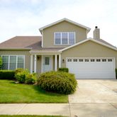 a view of a house with garden