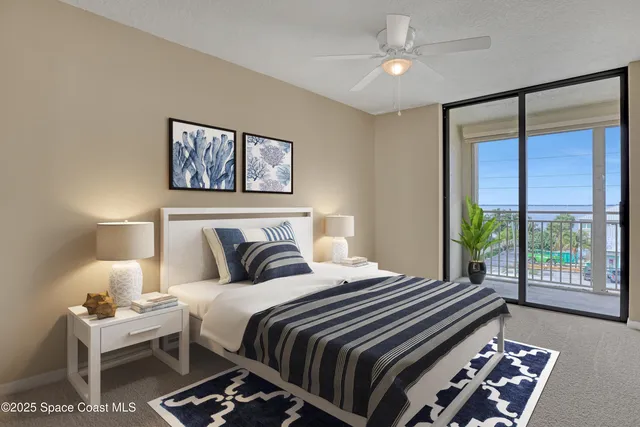 a view of a lake with a house in the background