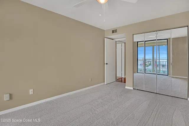 a view of swimming pool from a balcony