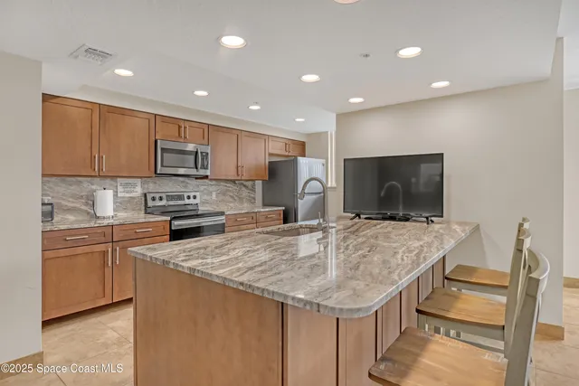 $730,000 | 3221 South Atlantic Avenue, Unit 404, Cocoa Beach, FL 32931