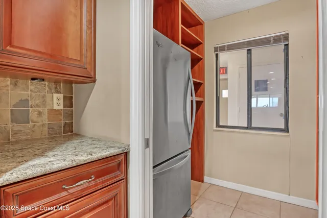 a kitchen with a sink and a window