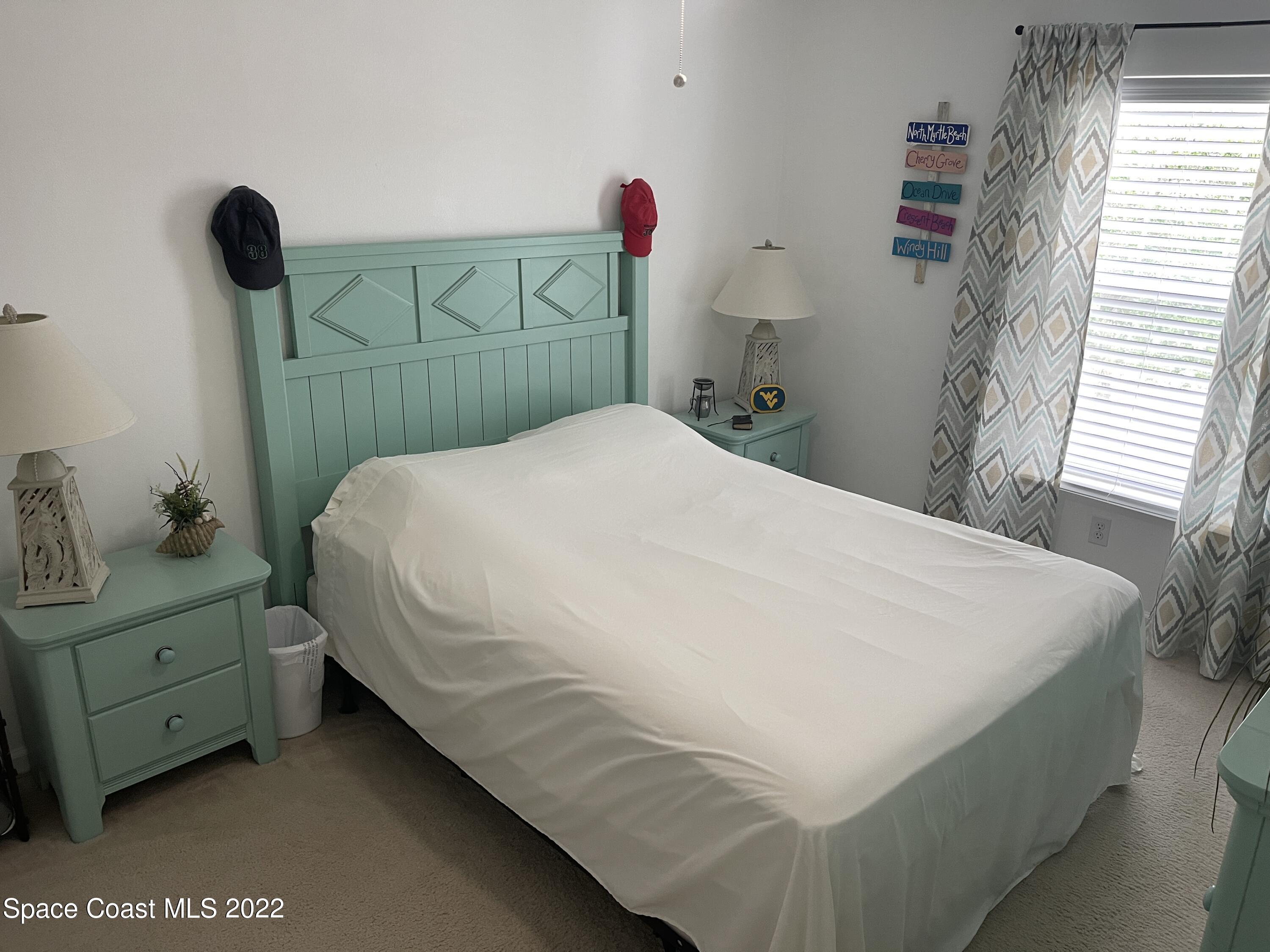 2795 Reston Street, Unit 105 Melbourne, FL 32935 - Photo 13 of 30 a bedroom with a bed and a window