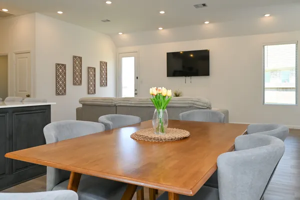 a view of a dining room with furniture