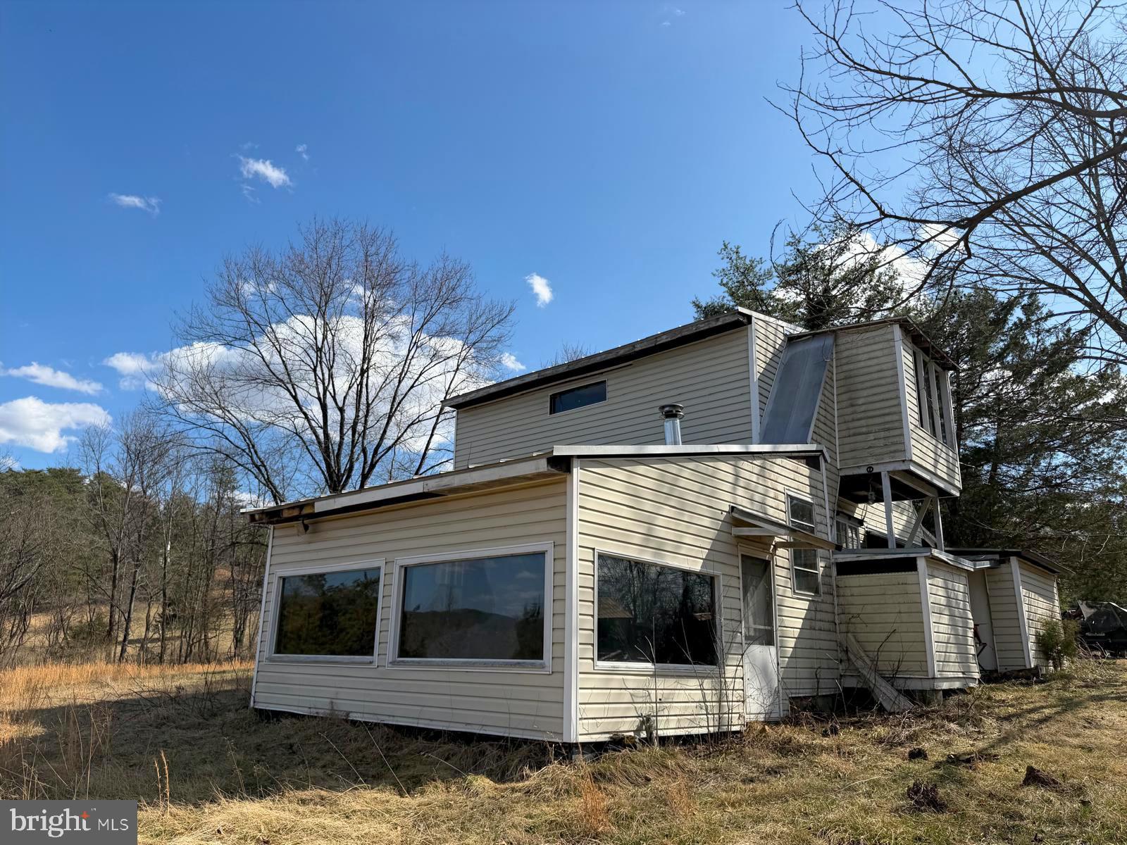 986 Rushing River Road Augusta, WV 26704 - Photo 3 of 40 North side enclosed porch w/hot tub