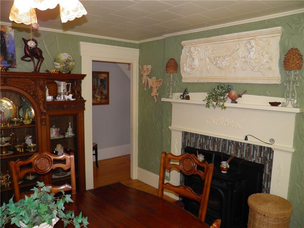 42 Rte 11 Patten, ME 04765 - Photo 7 of 29 Fireplace in the Dining Room