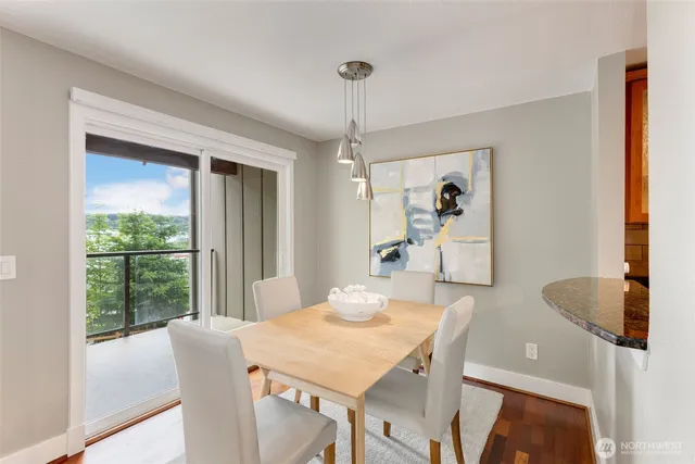 a dining room with furniture and window