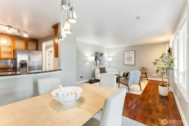 a bedroom with a bed and chandelier