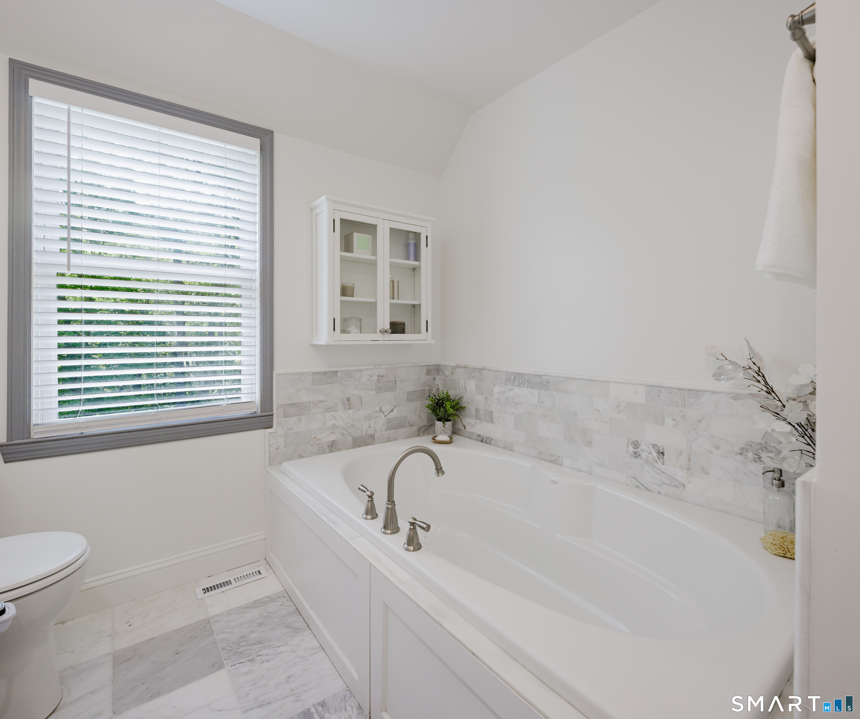 3 Partridge Trail Sherman, CT 06784 - Photo 29 of 37 a bathroom with bathtub and window
