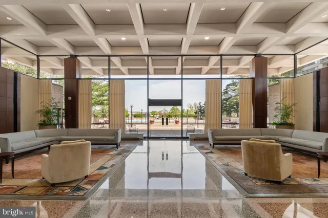 a living room with large windows