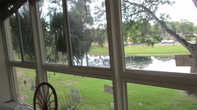 a view of backyard from a room