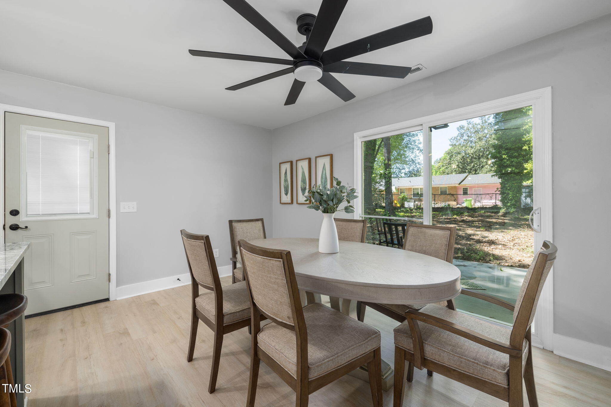 1200 Armstrong Circle Raleigh, NC 27610 - Photo 12 of 44 a view of a dining room with furniture window and wooden floor