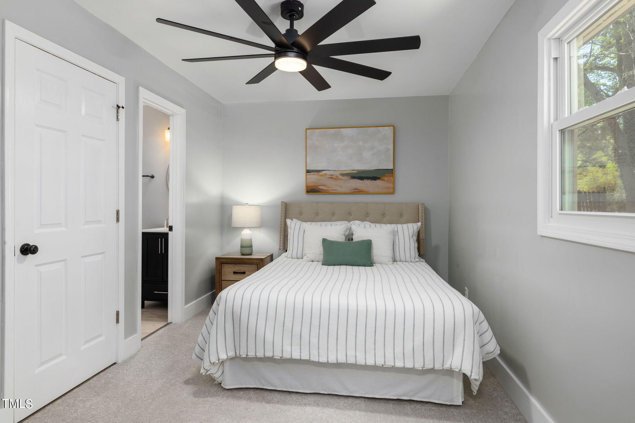 1200 Armstrong Circle Raleigh, NC 27610 - Photo 14 of 44 a bedroom with a bed and a painting on the wall