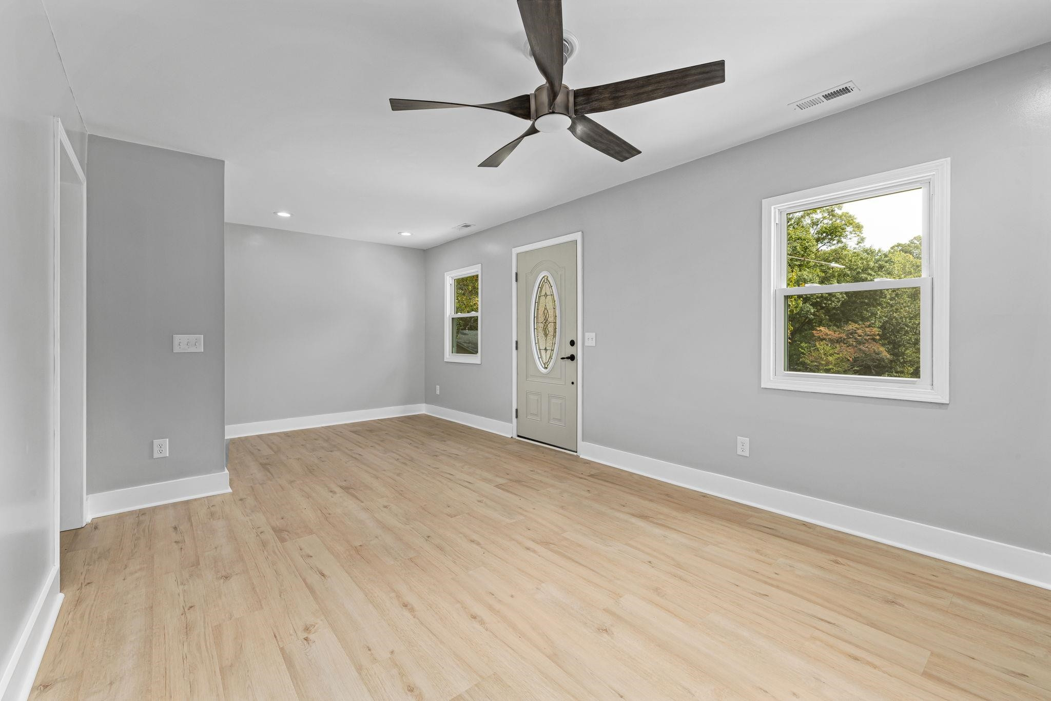 1200 Armstrong Circle Raleigh, NC 27610 - Photo 20 of 44 wooden floor in an empty room with a window