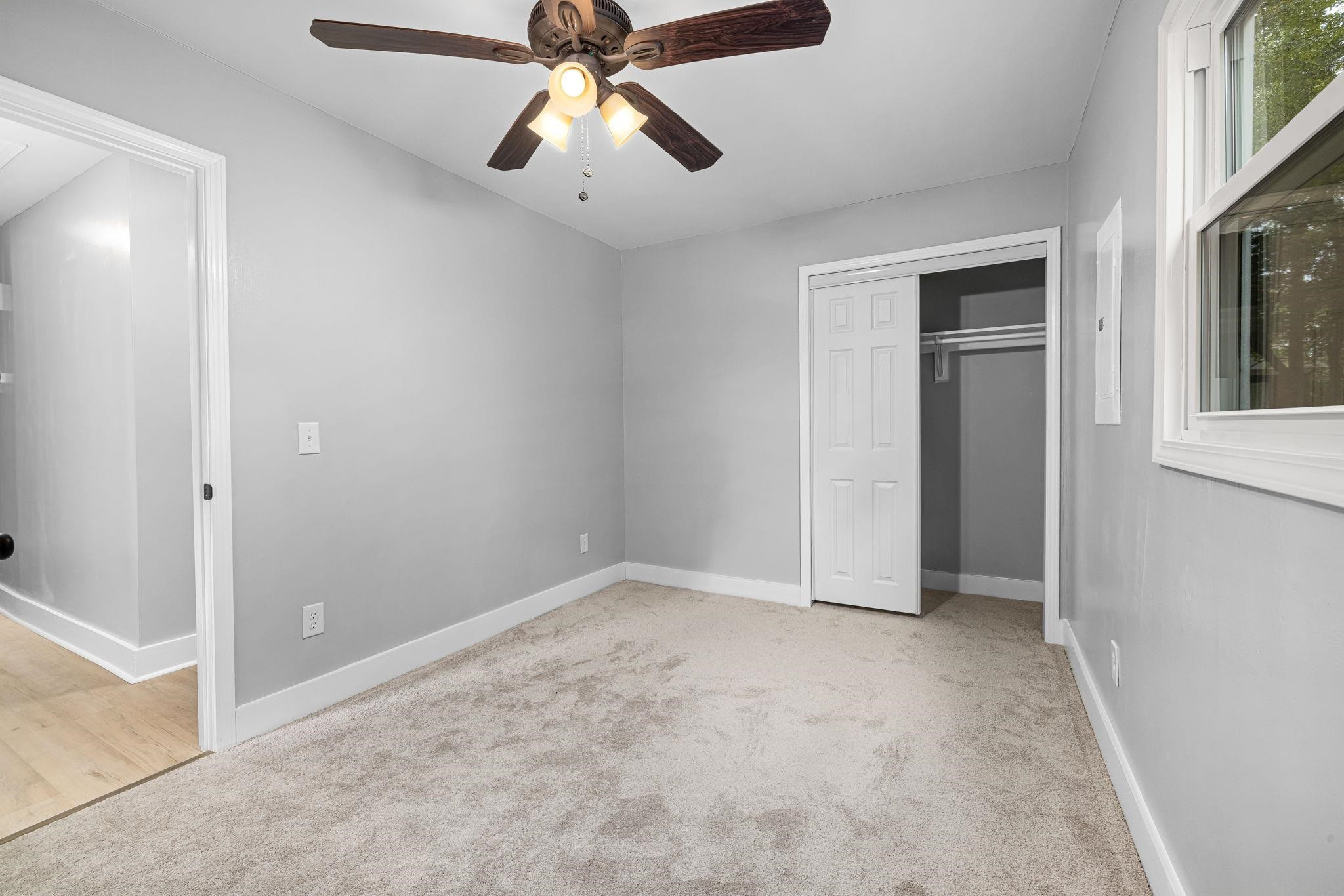 1200 Armstrong Circle Raleigh, NC 27610 - Photo 25 of 44 an empty room with chandelier fan