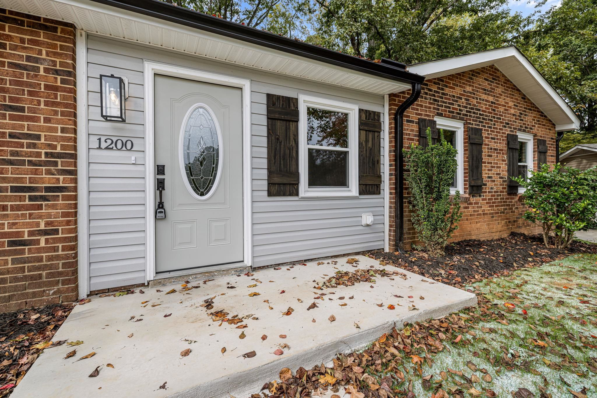 1200 Armstrong Circle Raleigh, NC 27610 - Photo 33 of 44 a front view of a house with garden