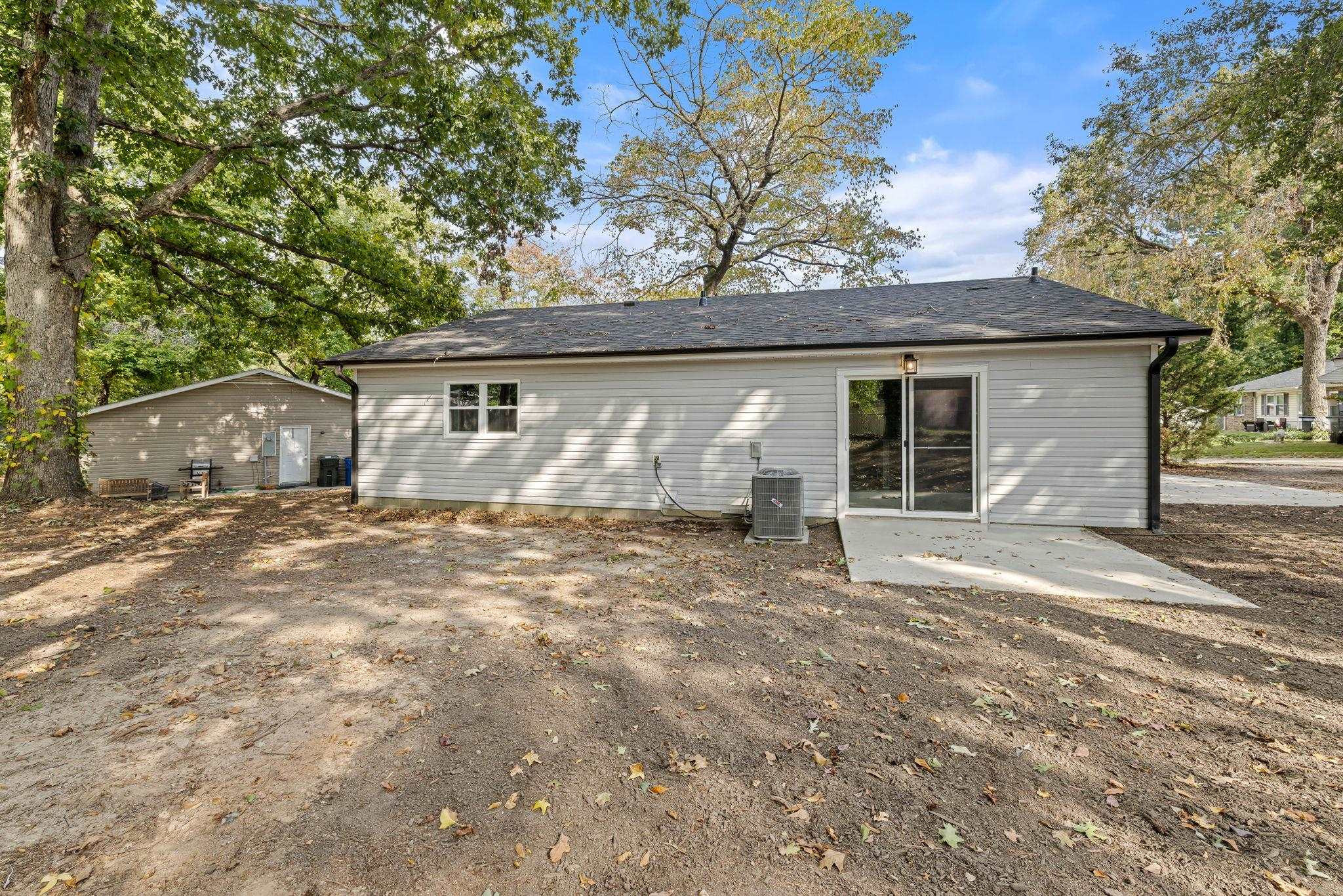 1200 Armstrong Circle Raleigh, NC 27610 - Photo 38 of 44 a front view of house with yard and trees in the background