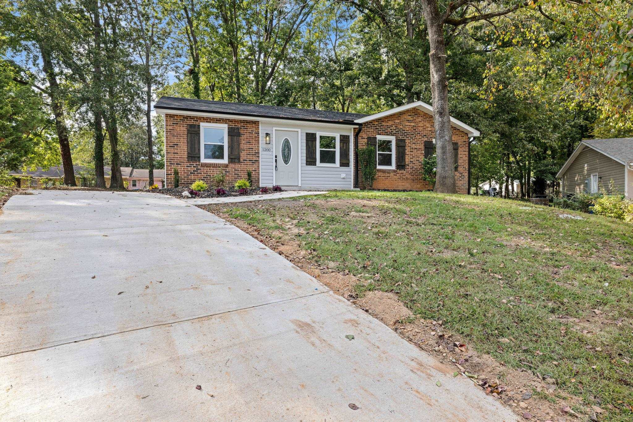 1200 Armstrong Circle Raleigh, NC 27610 - Photo 39 of 44 front view of a house and a yard