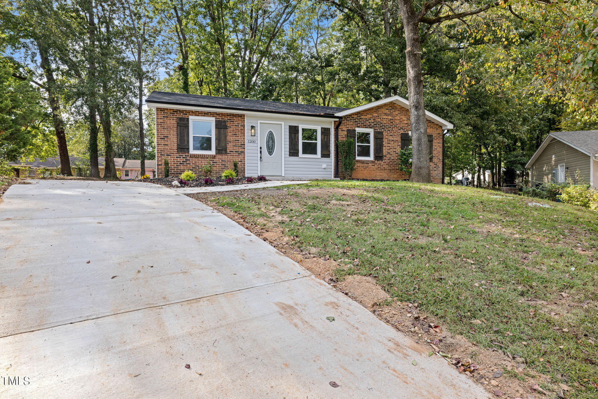 1200 Armstrong Circle Raleigh, NC 27610 - Photo 42 of 44 front view of a house and a yard