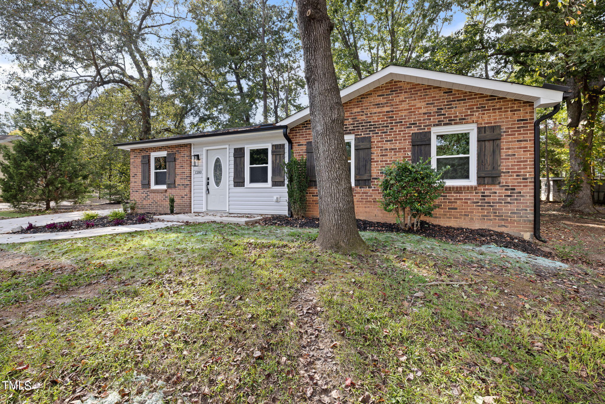 1200 Armstrong Circle Raleigh, NC 27610 - Photo 43 of 44 a front view of house with yard and trees around