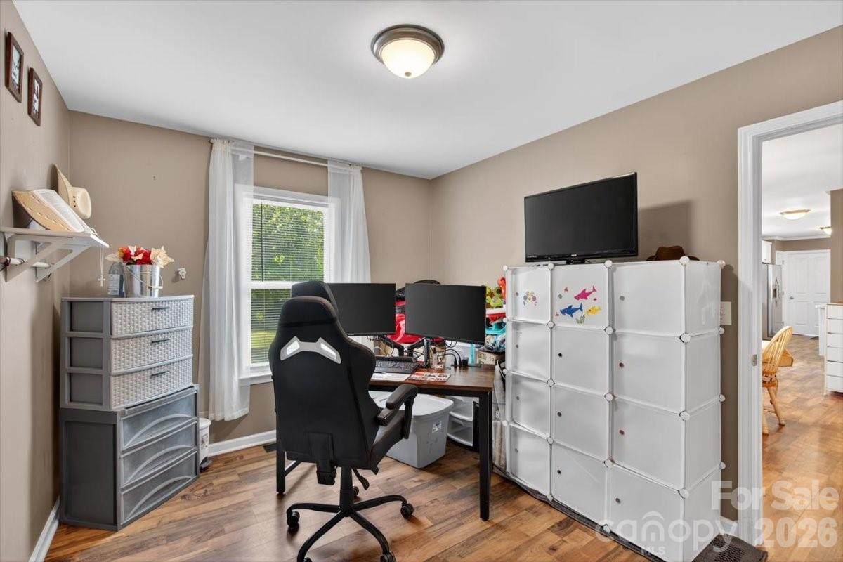 567 Godbey Road Mocksville, NC 27028 - Photo 15 of 38 a view of a workspace with furniture and a window