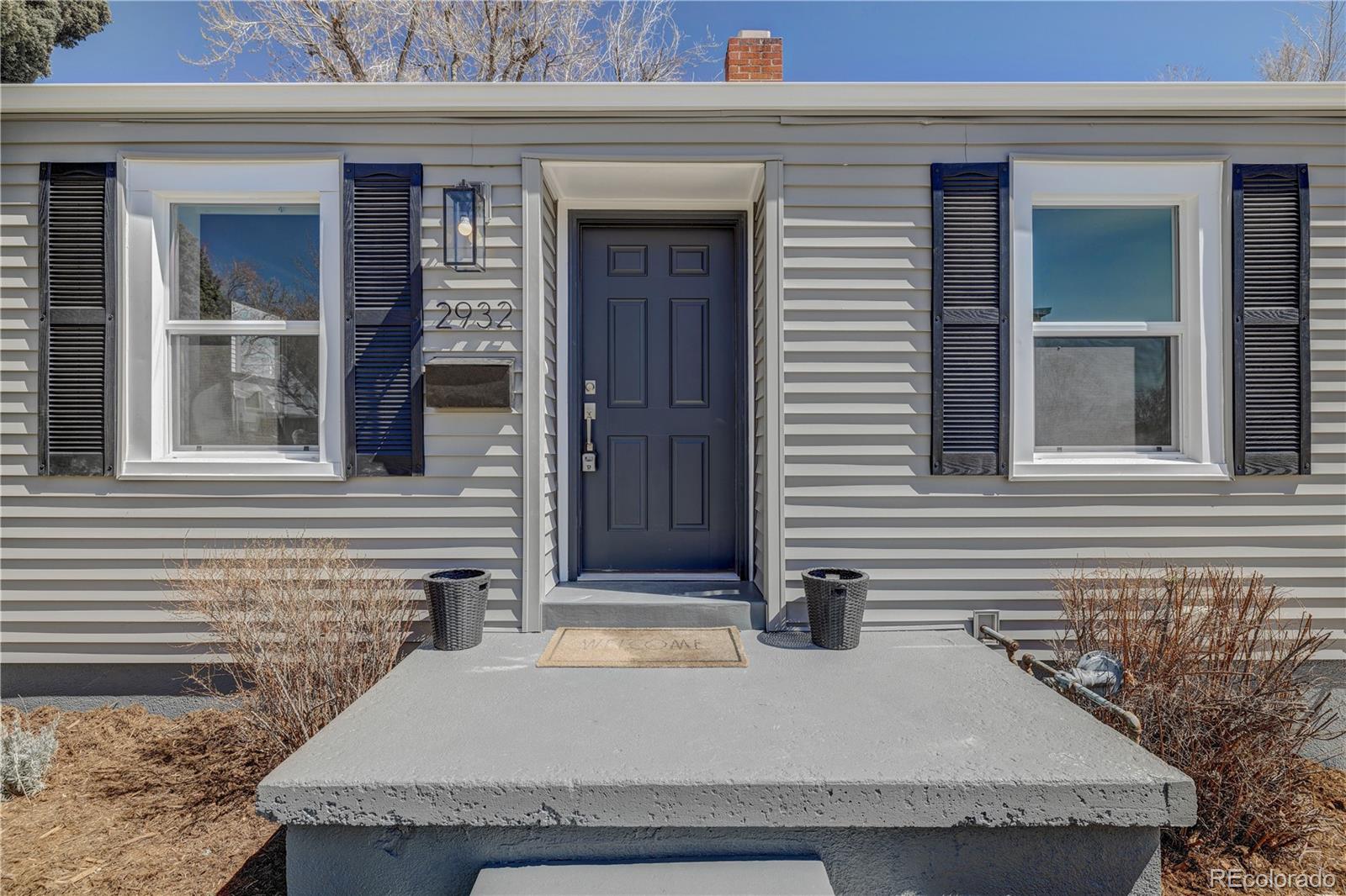 2932 Chase Street Wheat Ridge, CO 80214 - Photo 1 of 30 a view of house and front door