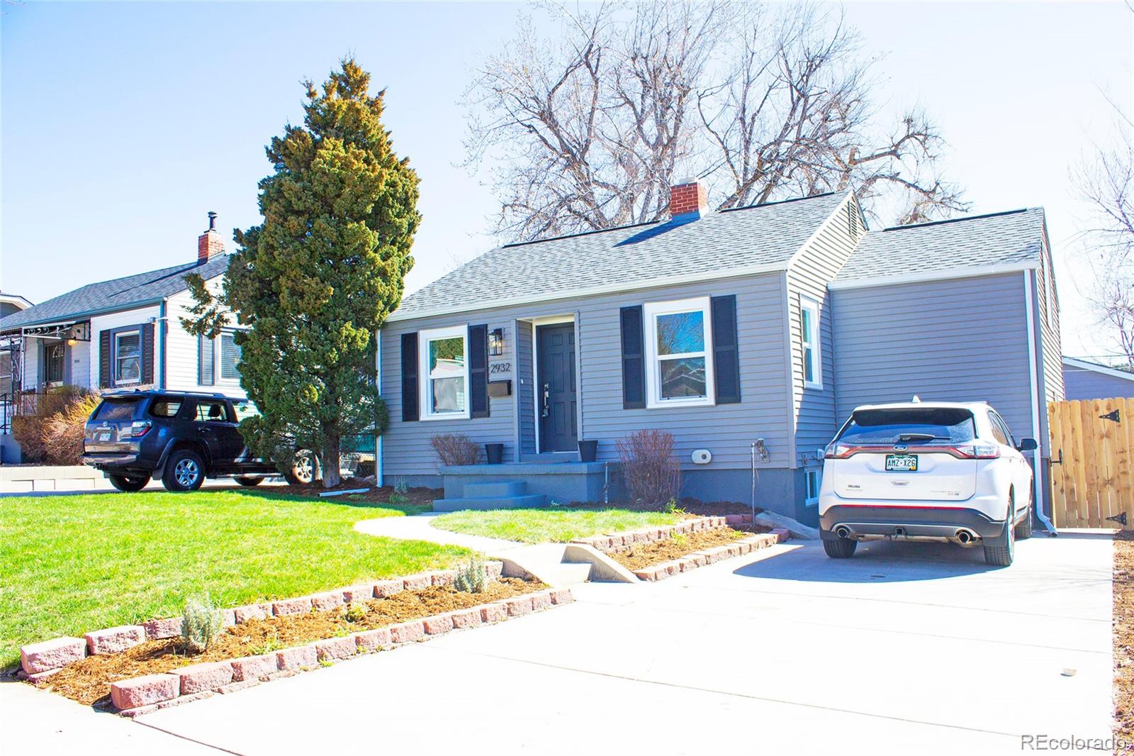 2932 Chase Street Wheat Ridge, CO 80214 - Photo 3 of 30 a car parked in front of a house