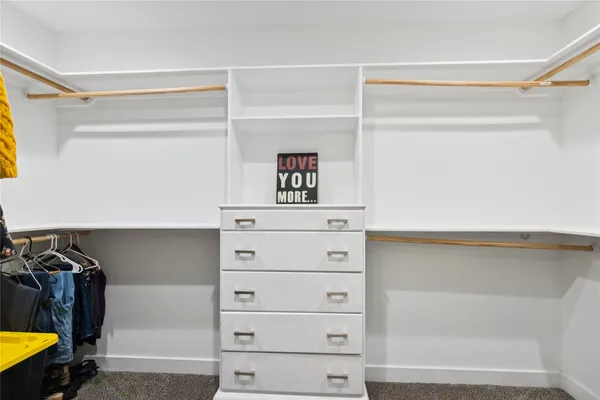 a bathroom with a sink a vanity and a mirror
