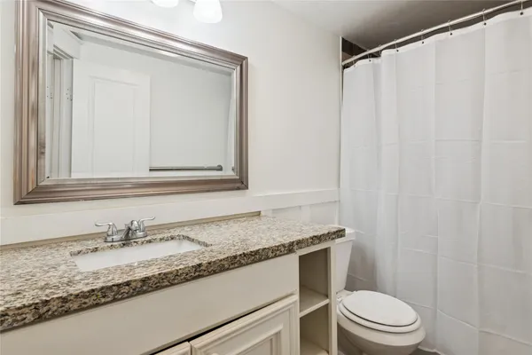 a workspace with furniture and wooden floor