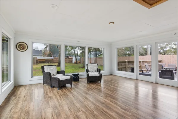 a view of livingroom with furniture wooden floor and window
