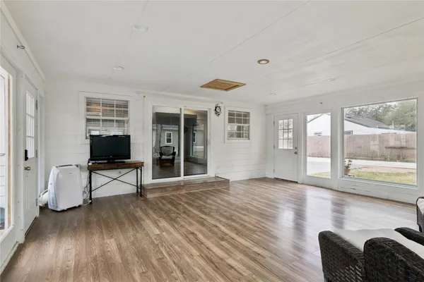 a view of a chairs and table on the deck