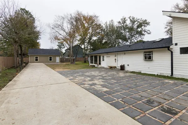 a house with trees in the background