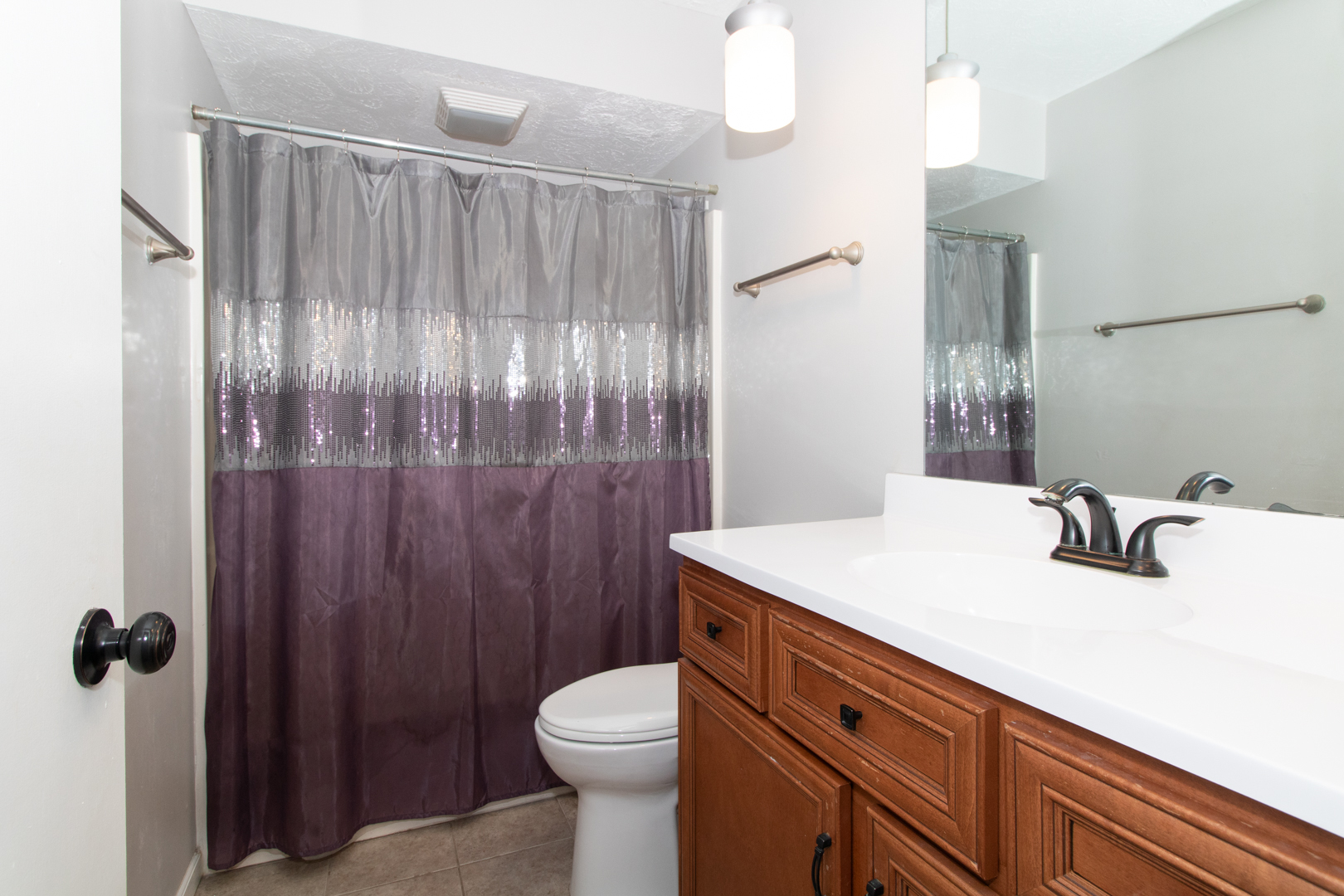 1705 Rockingham Drive, Unit 3 Normal, IL 61761 - Photo 11 of 31 a bathroom with a sink a toilet and shower