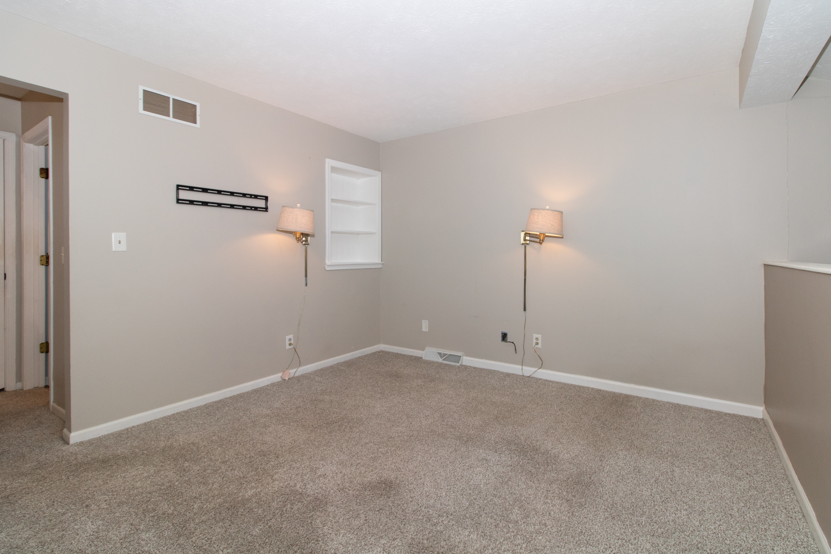 1705 Rockingham Drive, Unit 3 Normal, IL 61761 - Photo 22 of 31 a view of an empty room with a fan