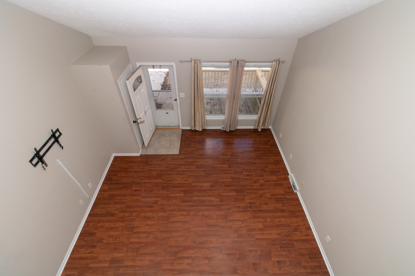 1705 Rockingham Drive, Unit 3 Normal, IL 61761 - Photo 24 of 31 a view of a hallway with wooden floor and staircase