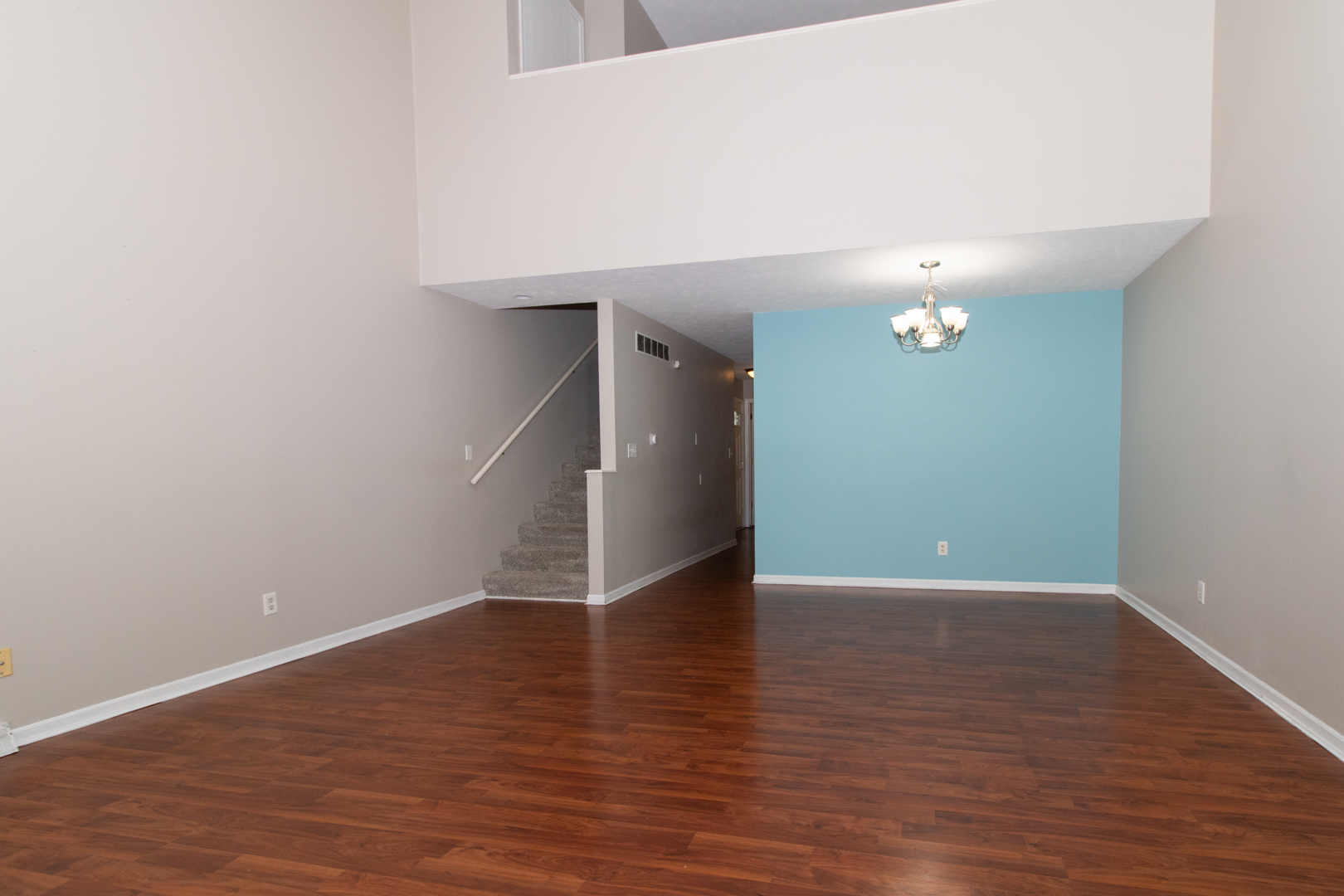 1705 Rockingham Drive, Unit 3 Normal, IL 61761 - Photo 3 of 31 a view of an empty room with wooden floor
