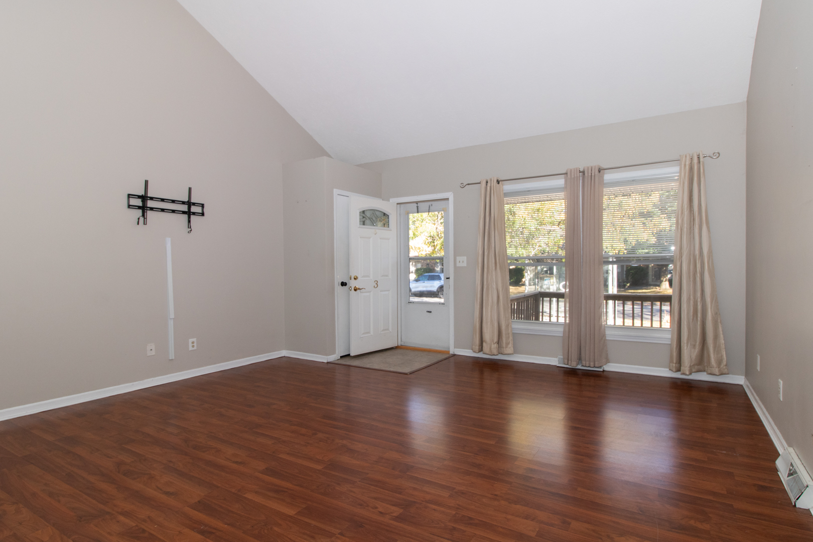 1705 Rockingham Drive, Unit 3 Normal, IL 61761 - Photo 5 of 31 wooden floor in an empty room with a window