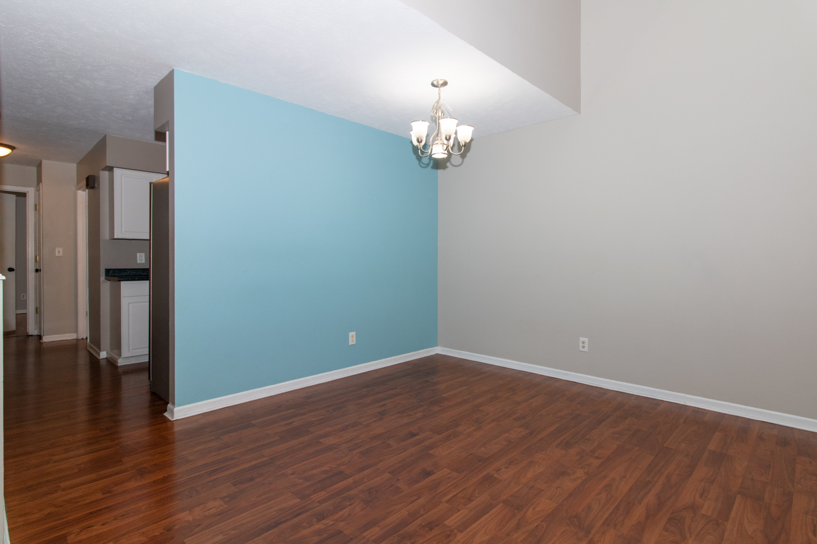 1705 Rockingham Drive, Unit 3 Normal, IL 61761 - Photo 7 of 31 wooden floor in an empty room with a window